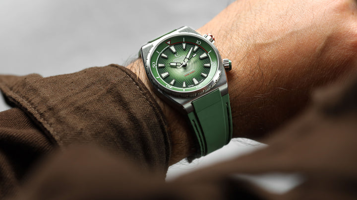 Edward Christopher custom mechanical watch on man's wrist – Manta model in forest green