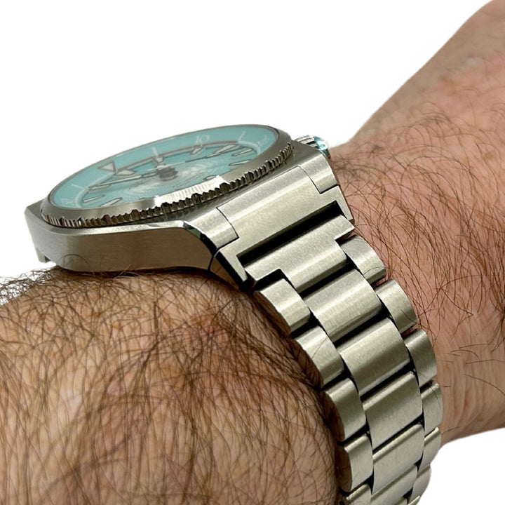 Edward Christopher custom mechanical watch strap adapters on stainless steel watch strap on Manta model in sky blue