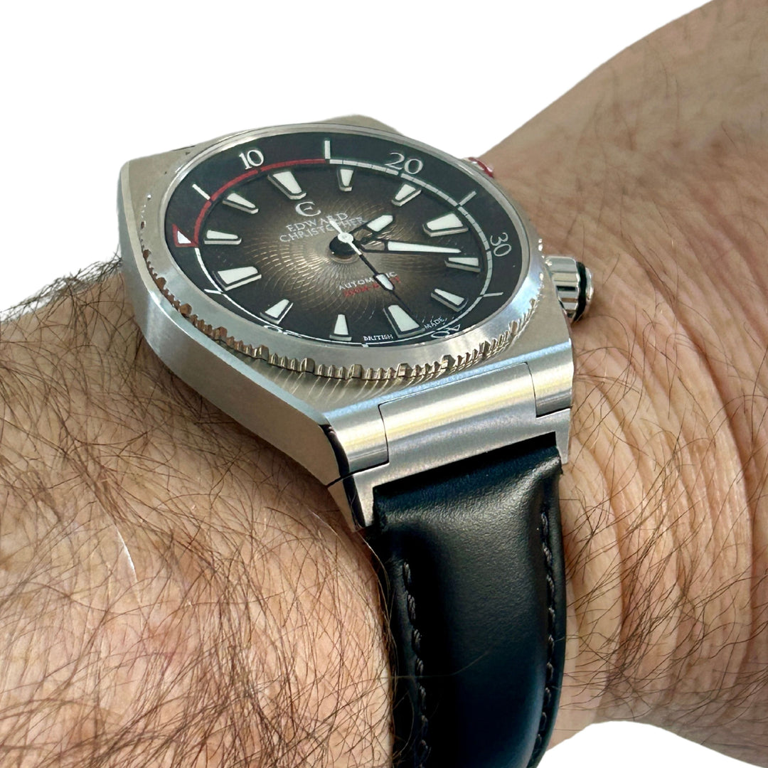 Edward Christopher custom mechanical watch strap adapters on black leather strap on Manta model in midnight black