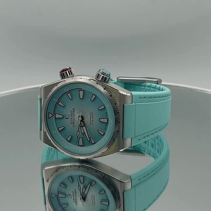 Edward Christopher custom mechanical watch – Manta model in sky blue rotating 360 degrees on mirrored turntable