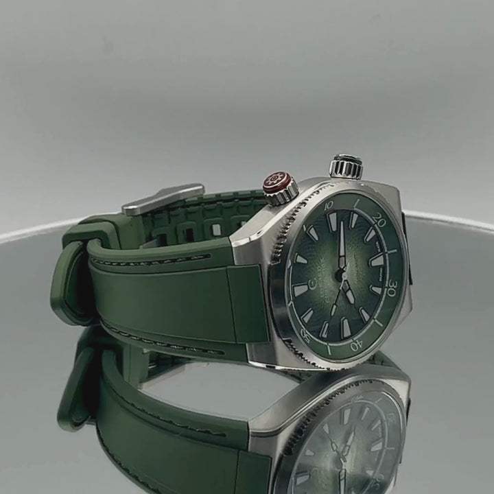 Edward Christopher custom mechanical watch – Manta model in forest green rotating 360 degrees on mirrored turntable