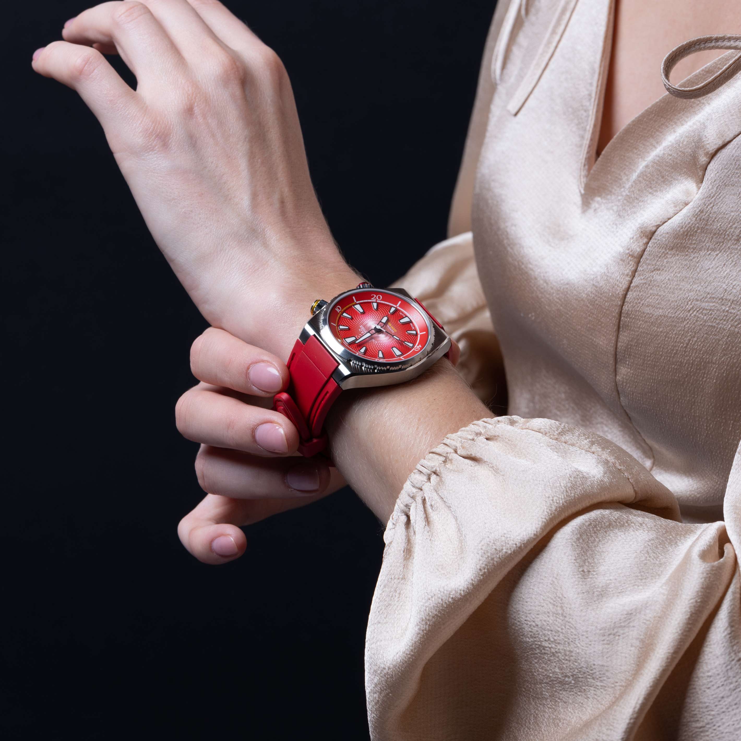 A Rose Red Edward Christopher Manta luxury watch, dive watch & sports watch on a woman's wrist