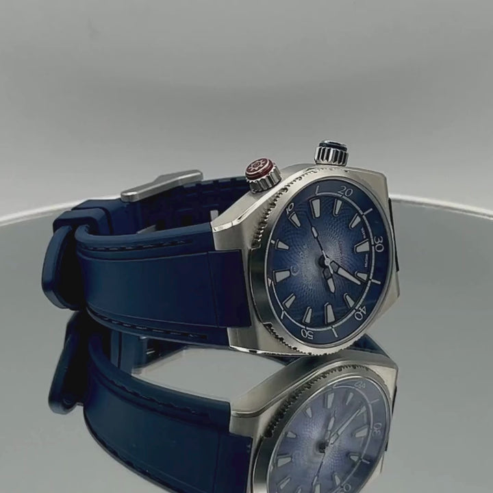 Royal Blue colour Edward Christopher Manta luxury watch, dive watch & sports watch from Edward Christopher watch shop rotating 360 degrees on mirrored turntable