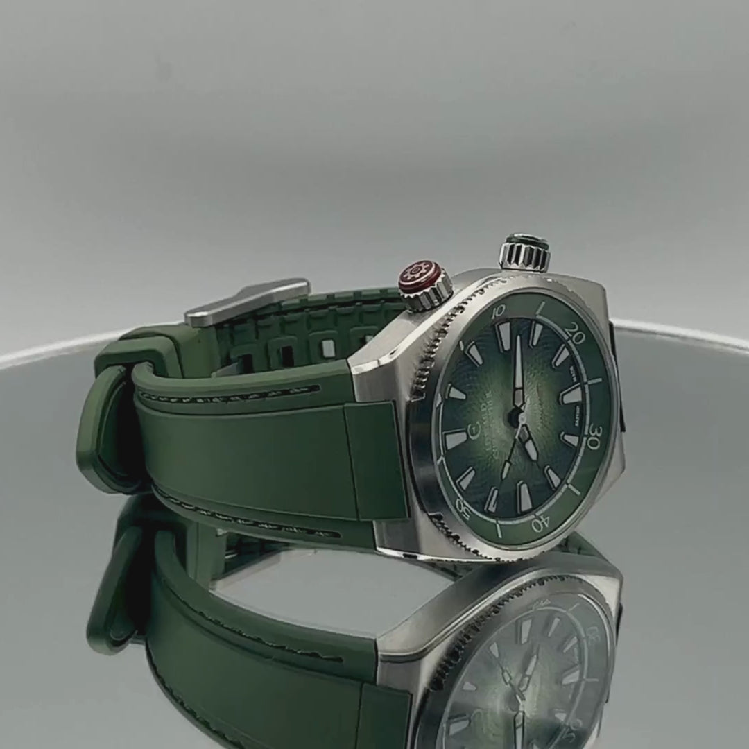 Forest Green colour Edward Christopher Manta luxury watch, dive watch & sports watch from Edward Christopher watch shop rotating 360 degrees on mirrored turntable